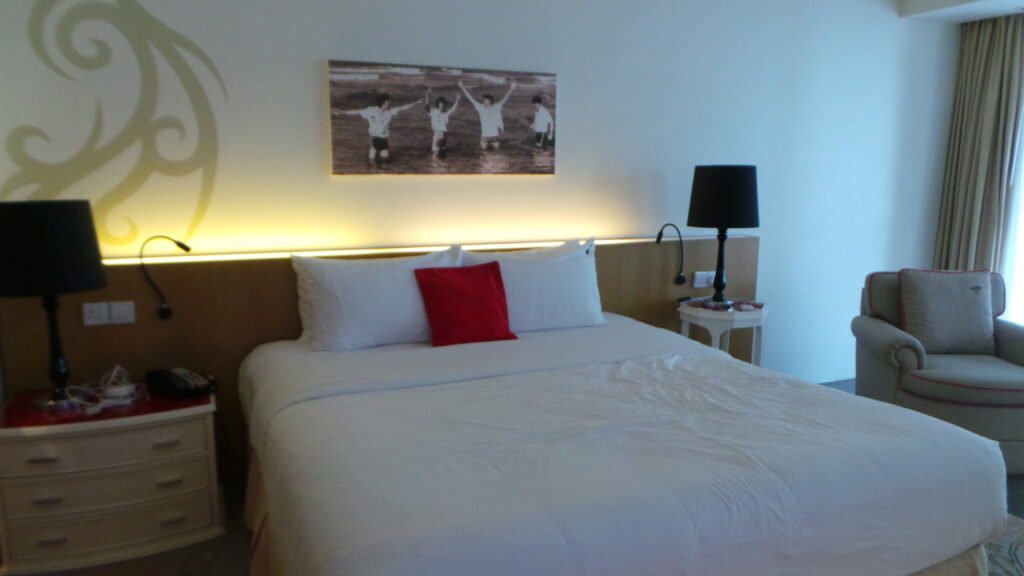 Bedroom in the Deluxe Lagoon Rooms at Hard Rock Hotel Penang